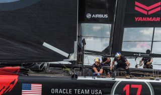 Look closely for red watch straps. The Oracle crew working the lines